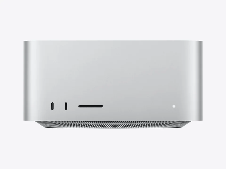 Front of the silver Apple Mac Studio with two USB-C ports and an SD card slot