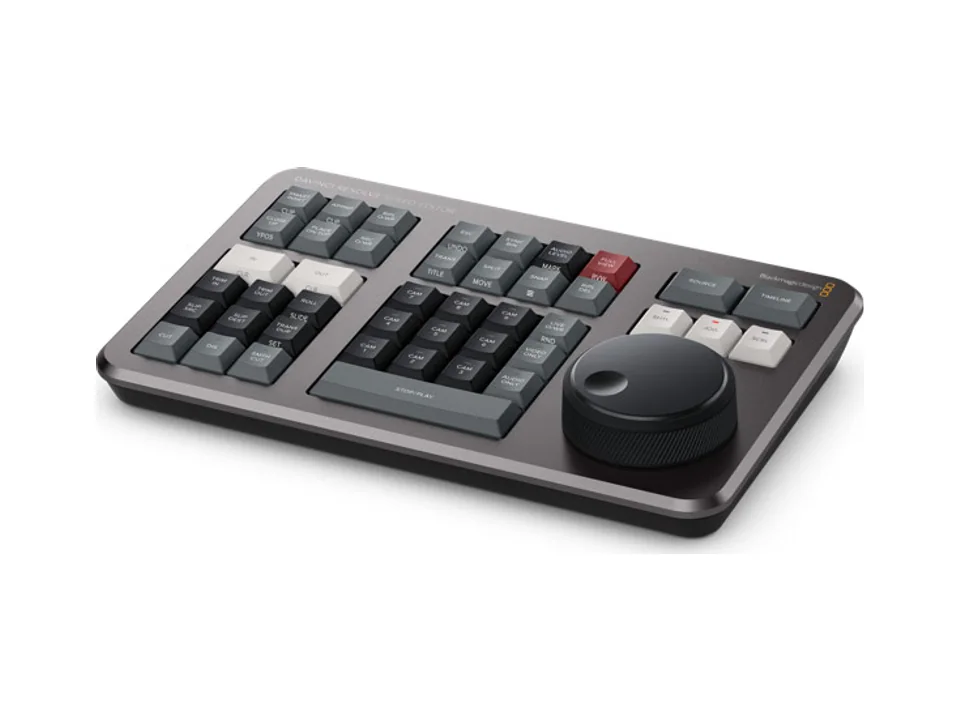 Blackmagic DaVinci Resolve Speed Editor keyboard with its search dial, three-quarter view