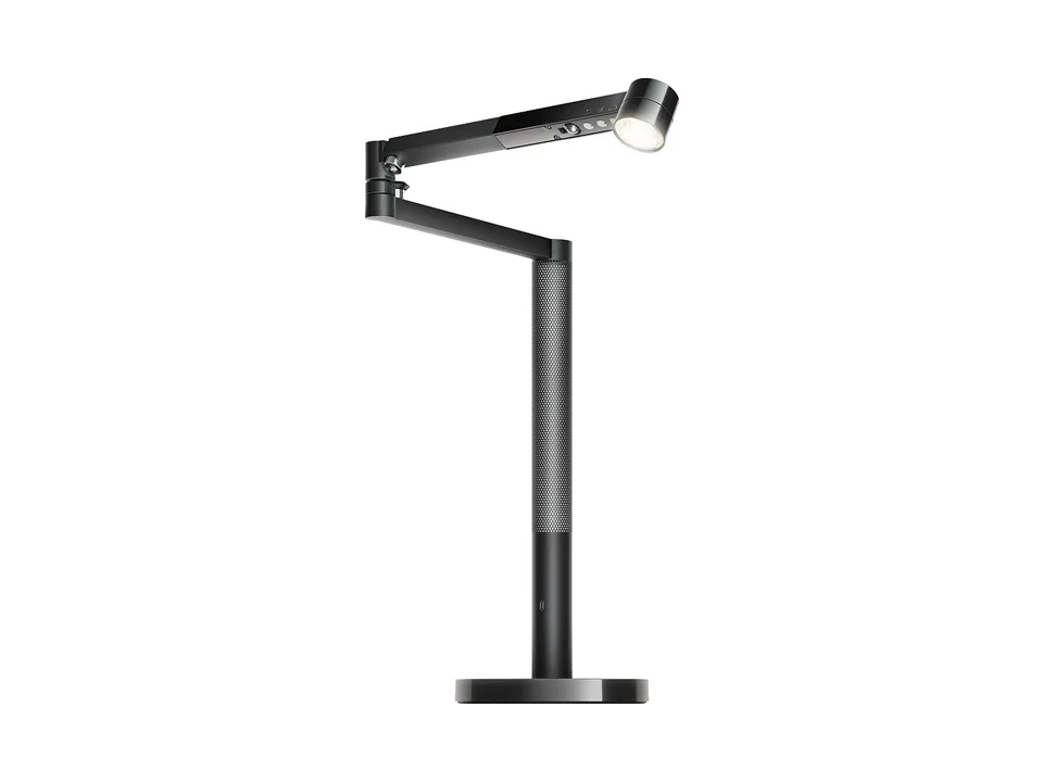 Black Dyson Solarcycle Morph desk light with its articulated arm and round base, on a white background