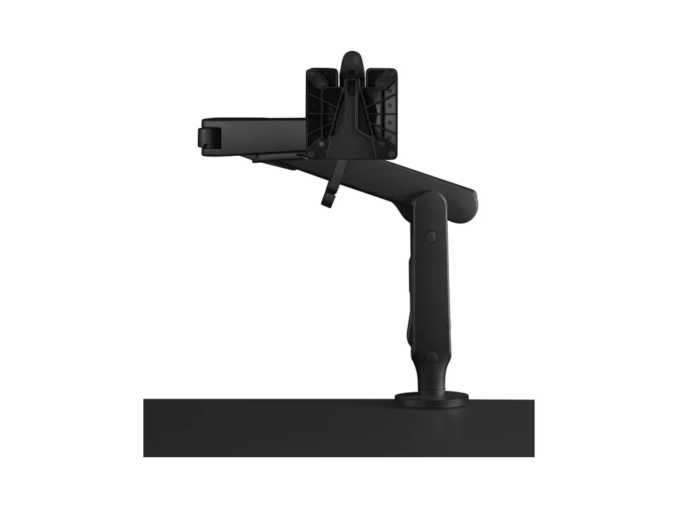 Black Herman Miller Ollin gaming monitor arm clamped to a desk edge, side view