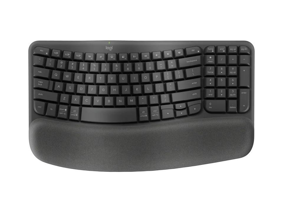 Teclado ergonómico Logitech Wave Keys en grafito con su reposamuñecas, vista superior sobre fondo transparente