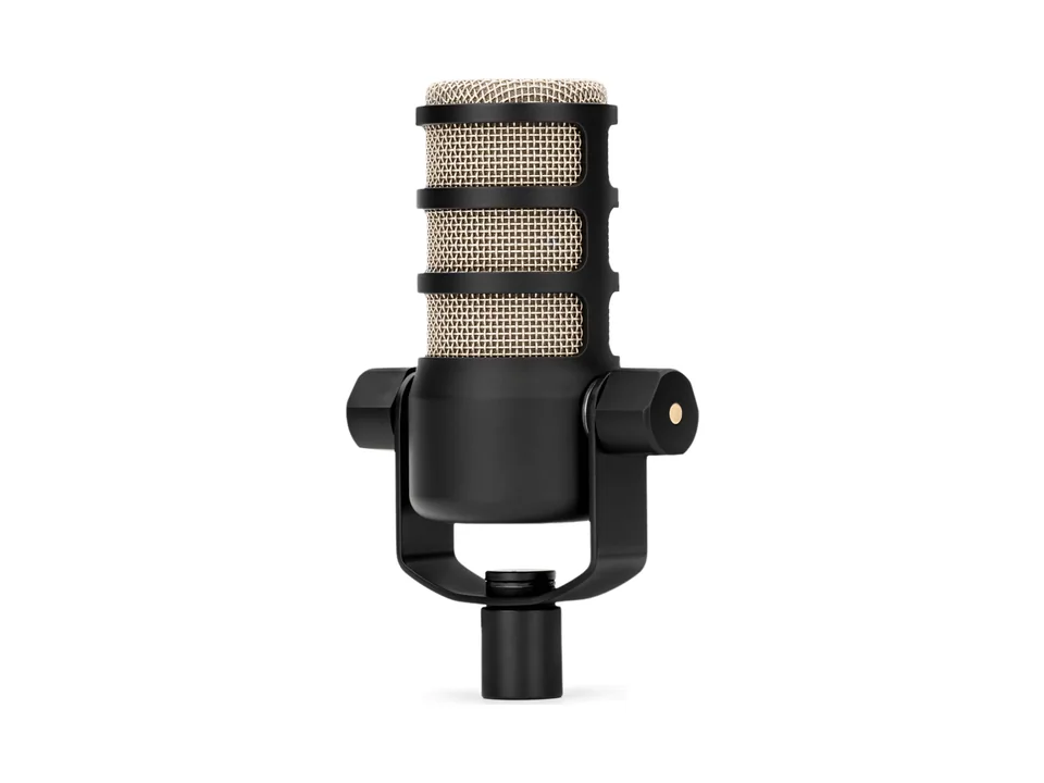 RØDE PodMic dynamic microphone with champagne grille on its black swivel mount, front view